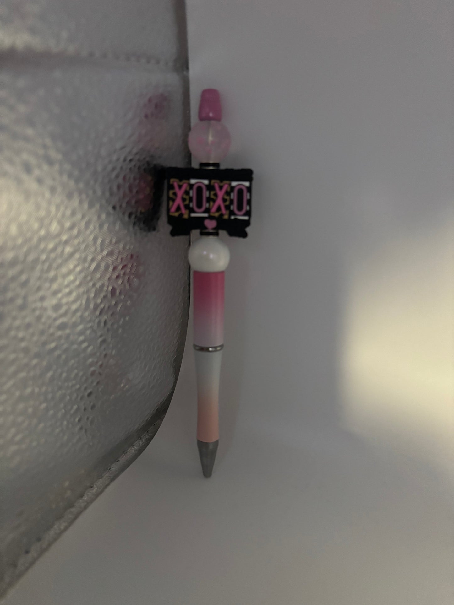 Pens, bookmarks and focal keychains